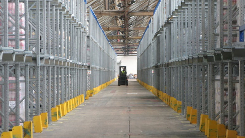 Drive-through racking with forklift