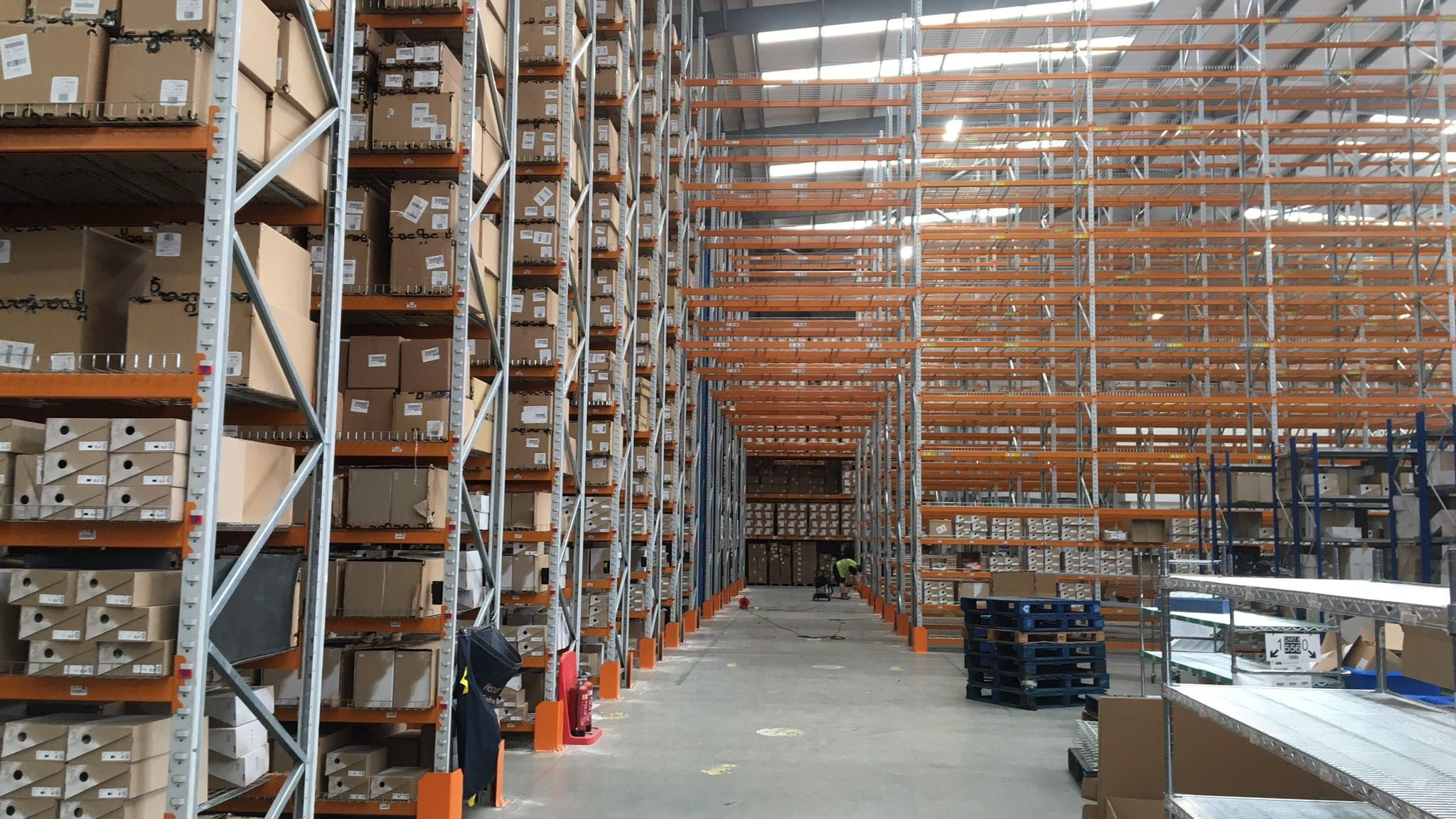 Adjustable Pallet Racking within a distribution centre containing pallets of stock