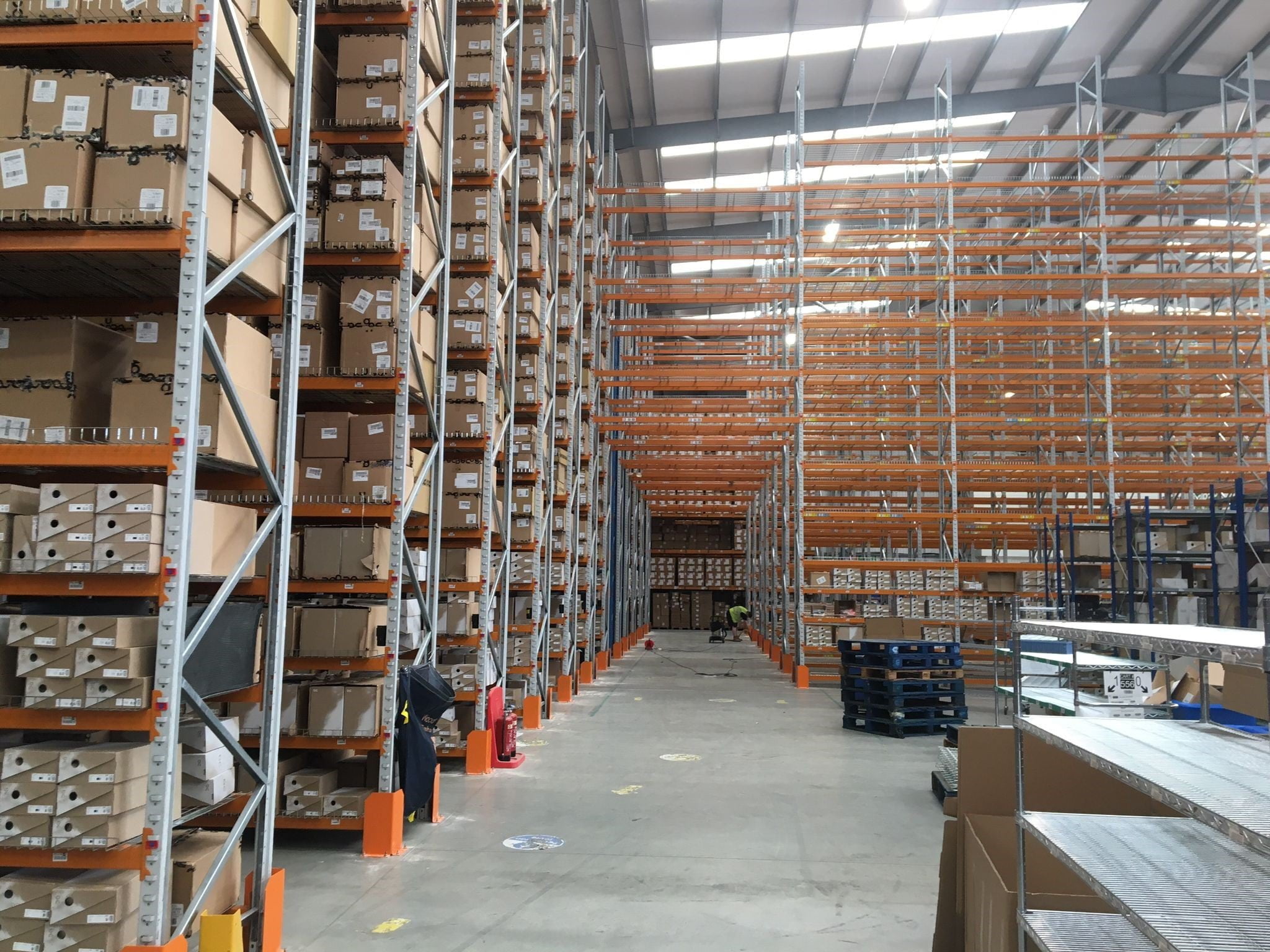 Adjustable Pallet Racking within a distribution centre containing pallets of stock